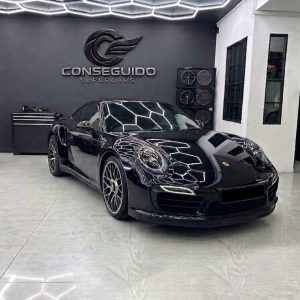 Black Porsche 911 Turbo S at Conseguido Supercars showroom